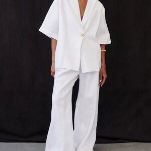 DISSH White Wide Leg Jumpsuit with Belted Waist